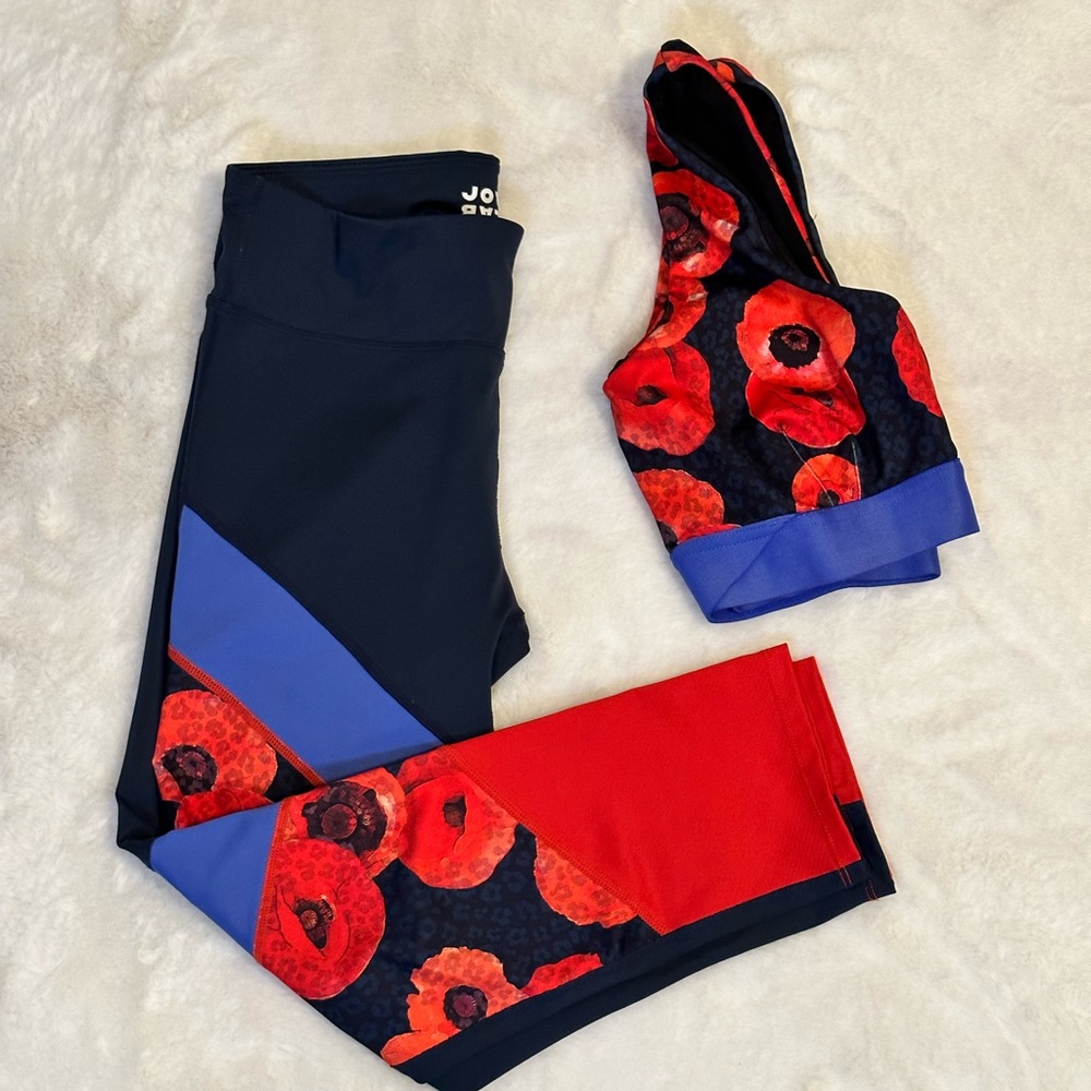 A vibrant floral pattern, navy crop leggings & sports bra by Joy Lab.